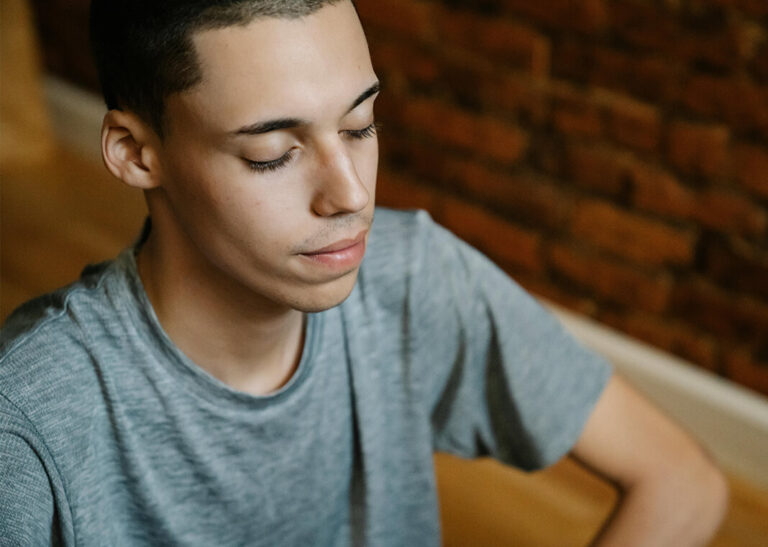 reflective-young-man-with-eyes-closed-1068x760-1.jpg