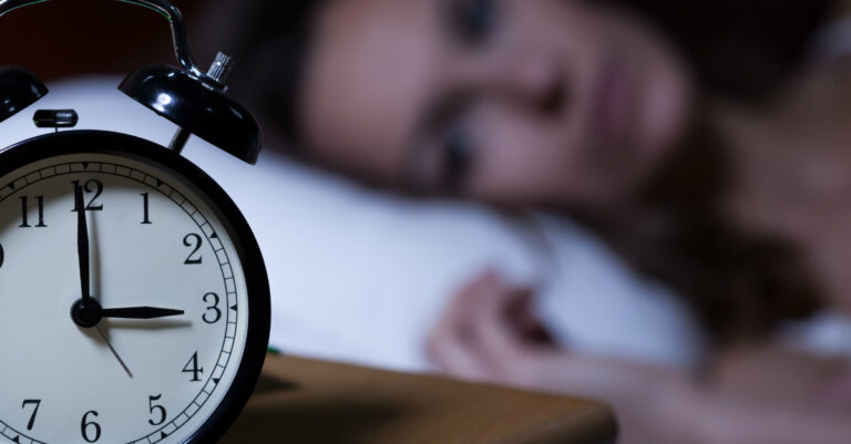 5422-woman-awake-sleepless-clock-gettyimages-atarz.jpg