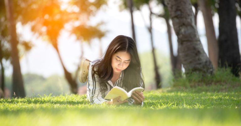 25052-girl-reading-in-field-gettyimages-vichienpetc.jpg