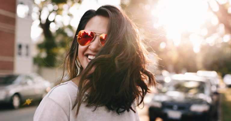 5425-woman-happy-smiling-sunny-unsplashmatthewhami.jpg