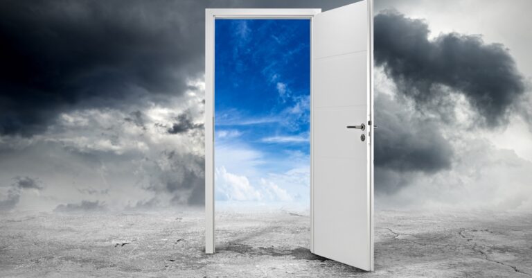 15182-open-door-revealing-blue-sky-in-middle-of-dar.jpg