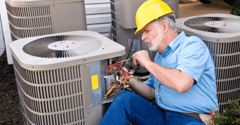 Air-conditioning-repairman-at-work.png