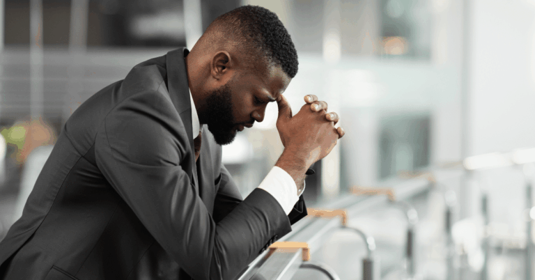 Overwhelmed-man-feeling-down.png