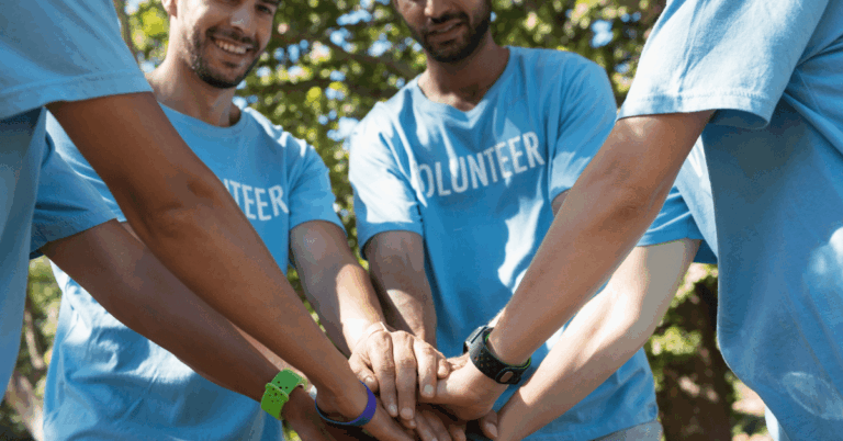 Volunteers-forming-a-handstack.png