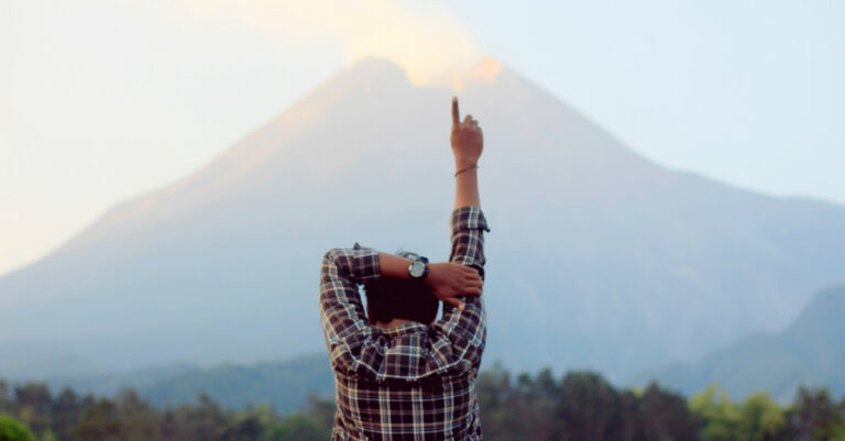 7291-man-pointing-upward-outdoors-unsplash-iyan-ku.jpg