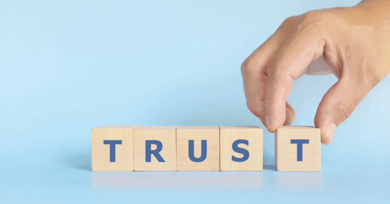 Hand-stacking-wooden-blocks-with-the-word-trust.png