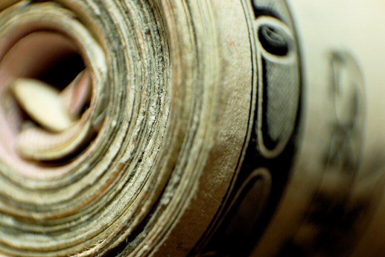 Money_roll_Credit_Zack_McCarthy_via_Flickr_CC_BY_20_CNA_7_28_15.jpg