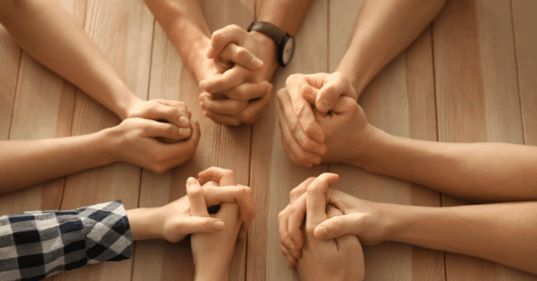 Small-Group-of-People-Praying.png