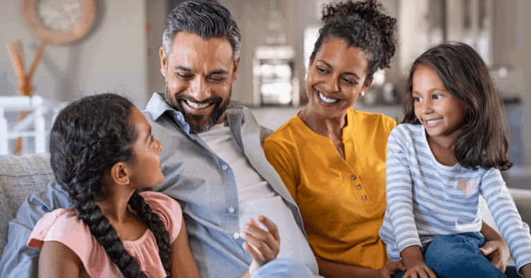 Happy-family-sitting-together.png