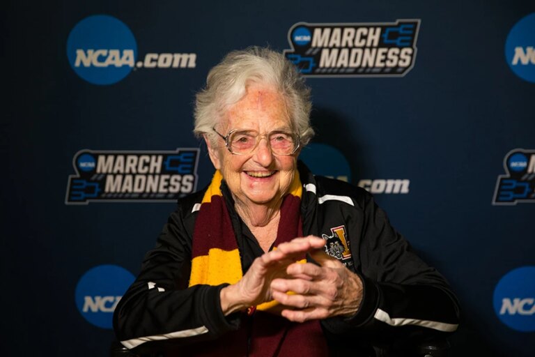 Sister_Jean_Dolores_Schmidt_at_the_first_round_game_of_the_NCAA_Tournament_in_Dallas_TX_on_Thursday_March_15_2018_Credit_Lukas_Keapproth_Loyola_University_Chicago_CNA.jpg