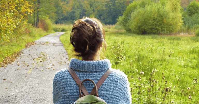 Woman-walking-on-a-path.png
