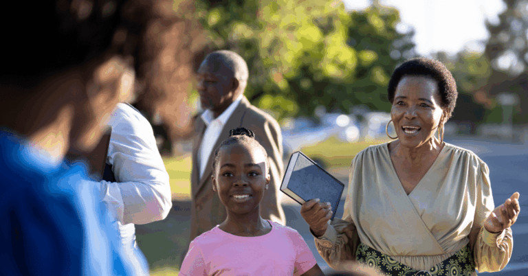 Family-Being-Greeted-At-Church.png