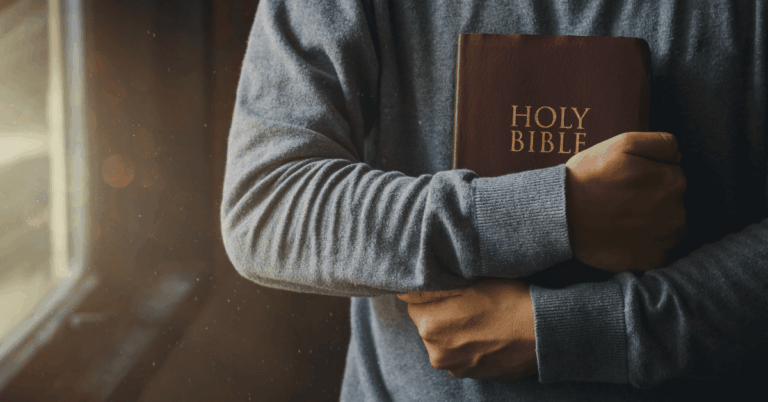 Man-Holding-a-Bible.png