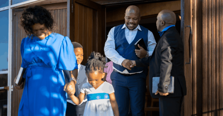 Pastor-Saying-Goodbye-to-Family-Leaving-Church.png
