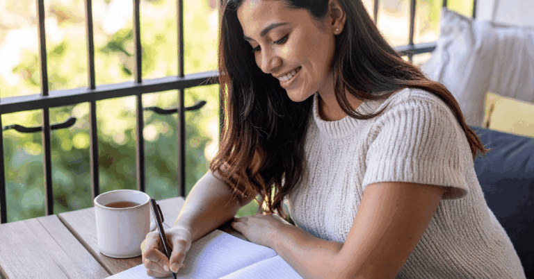 Woman-Writing-in-a-Journal.png