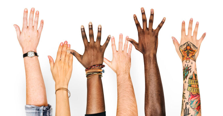 12354-multicultural-diverse-arms-raised-gettyimages.jpg