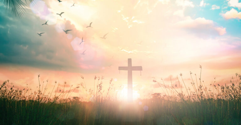 11627-cross-in-hazy-field-easter-resurrection-sunri.jpg