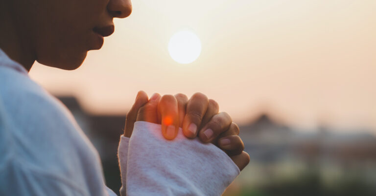 11653-woman-praying-gettyimages-tinnakorn-jorruang.jpg