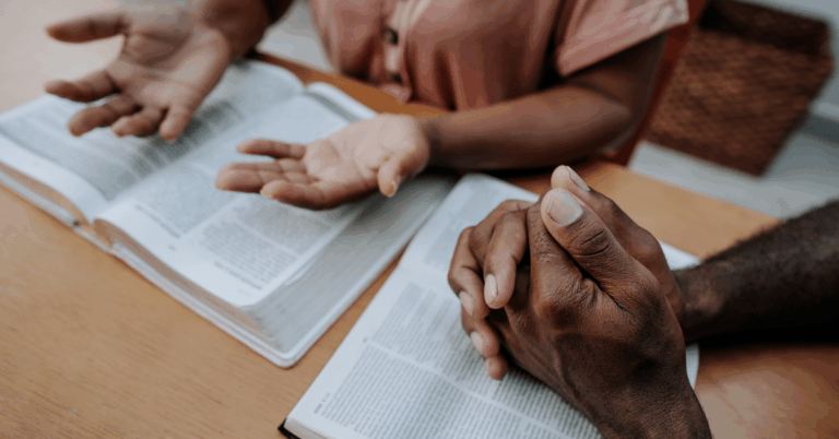 Church-Members-Praying-with-the-Bible.png