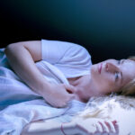 9784-woman-waking-from-nightmare-sleep-dream-getty.jpg