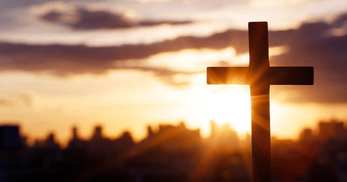 Cross-Steeple-on-Church-With-City-Skyline.png